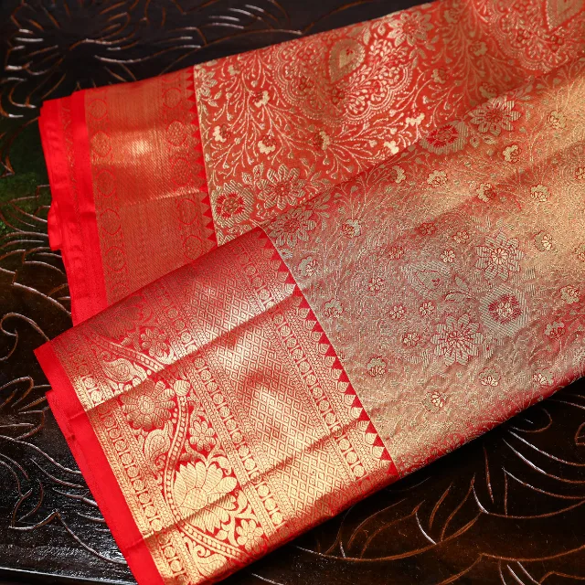Peach Orange Floral Zari Handloom Silk saree